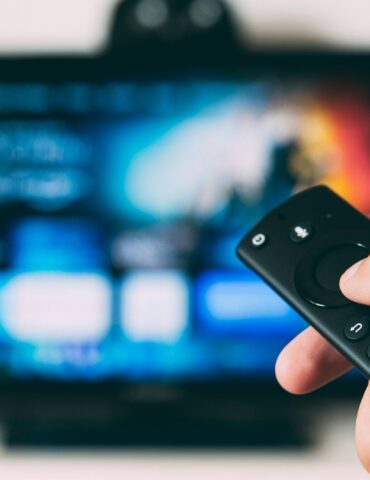turned-on flat screen television